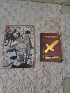 lot 147 image: Gaming Collection Bundle - Anime Metal Poster and Minecraft Combat Handbook