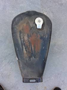 lot 191 image: Motorcycle Gas Tank with Decorative Engravings