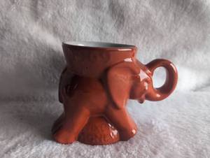 lot 506 image: Frankoma Nixon Agnew Orange Ceramic Elephant Mug