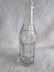 lot 1001 image: Bottling Works Clear Glass Soda Bottle