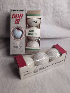 lot 1501 image: Dunlop DDH III Distance Monster Golf Balls and Zippo SD Golf Balls Bundle