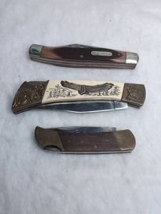 lot 1512 image: Old Timer Pocket Knife Collection with Eagle Scrimshaw Bone Handle