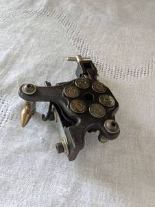 lot 1518 image: Professional Tattoo Machine Gun Part with Bullet Casings Design