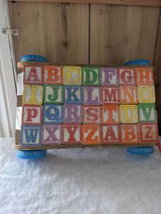 lot 4003 image: Vintage Wooden Alphabet Block Wagon Pull Toy