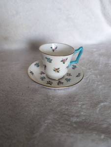lot 5016 image: Crown Staffordshire Demitasse Cup and Saucer with Floral Pattern