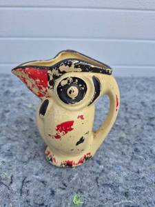 lot 16 image: Hand Painted Folk Art Face Pitcher