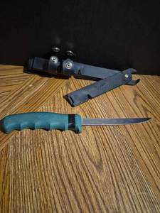 lot 22 image: Fisherman Solution Fillet Knife with Sharpener and Sheath