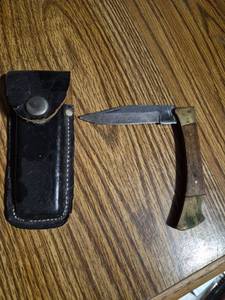 lot 25 image: Folding Blade Knife with Leather Sheath