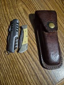 lot 26 image: Multi-Tool Pocket Knife with Folding Utility Knife and Leather Sheath