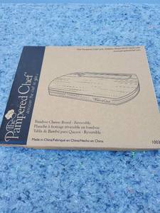 lot 76 image: Pampered Chef Bamboo Reversible Cheese Board