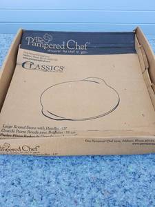 lot 77 image: Pampered Chef Large Round Stone with Handles 15 Inch Pizza Stone