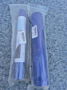 lot 85 image: Blue Heat Transfer Vinyl Rolls 12 inch x 5 feet - One Looks Unused The Other is Partial Roll