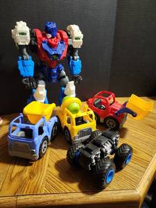 lot 209 image: Mixed Toy Vehicle Lot with Transforming Robot and Construction Trucks