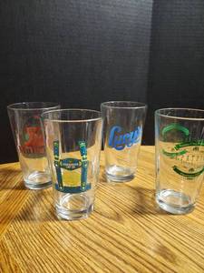 lot 210 image: Collectible Restaurant and Event Pint Glass Set
