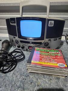 lot 221 image: The Singing Machine KaraokeVision SMVG-620 CDG Karaoke System with Microphone and CDs