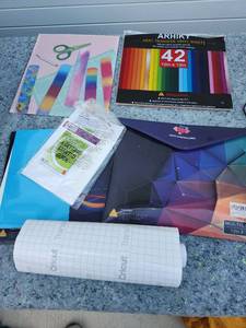 lot 275 image: Heat Transfer Vinyl Sheets Bundle with Transfer Tape and Tools See All Pictures for Contents
