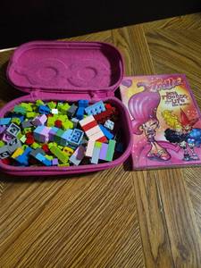 lot 297 image: LEGO Building Blocks with Pink Storage Case and Trollz DVD
