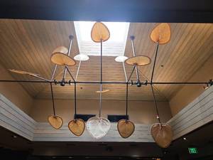 lot 21501 image: Modern Linear Rotating Chandelier with Natural Fiber Pendant Shades