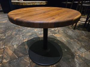 lot 21648 image: Round Wood Top Dining Table with Black Pedestal Base