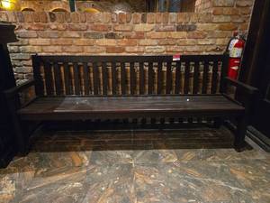 lot 21663 image: Dark Wood Slat Back Bench with Arms