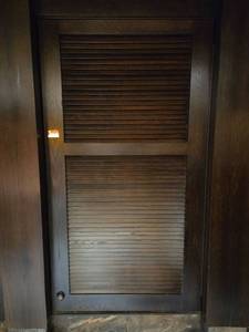 lot 21666 image: Wood Louvered Closet Door Right Hinge