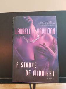 lot 2288 image: A Stroke of Midnight by Laurell K. Hamilton Hardcover Novel