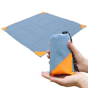 lot 16290 image: OrgaNeat Pocket Picnic Blanket, Sandproof Lightweight Pocket Camping Tarp, 55��x 60�� Foldable & Fits into Small Bag, Water Resistant Washable Quick Dry Compact Beach Mat for Outdoor Recreation