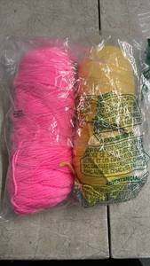 lot 16331 image: Pink and Yellow Yarn Rolls