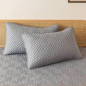 lot 2195 image: Small gray travel pillow with blue bag