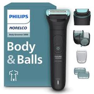 lot 5444 image: Philips Norelco Electric Shaver with Manual and Accessories used