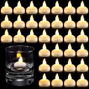 lot 2297 image: Honoson 24 Pack Flameless LED Floating Candles 1.6 Waterproof LED Floating Tealights Battery Water Activated Tealights for Valentines Day Weddings Pool Centerpiece Party Decor(Yellow)
