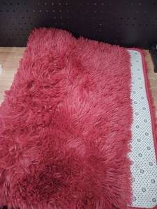 lot 14464 image: Home Decor Red Fuzzy Rug 38 x 24 in