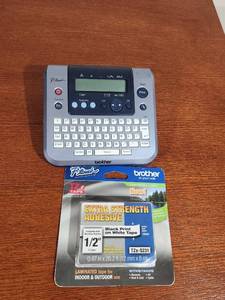 lot 205 image: Brother P-Touch Label Maker with Extra Strength TZe Tape