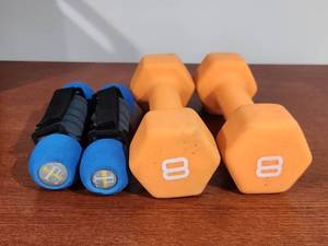 lot 206 image: Orange 8lb Hand Weights and Small Weight Set