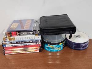 lot 232 image: Mixed Media Bundle with DVDs, CD-R Discs and Storage Case