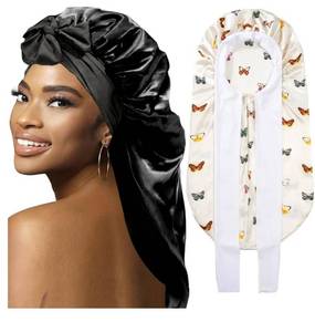 lot 37270 image: 2Pcs Bonnets for Black Women Braid Bonnet, Large Long Satin Bonnet for Braids, Silk Bonnet with Stretchy Tie Band Sleep Cap Hair (2Pcs-Black-Silver Pattern) - Retail $10