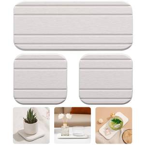 lot 37385 image: 3PCS Water Absorbing Diatomaceous Earth Tray for Sink, Fast Drying Soap & Toothbrush Holders for Bathroom Counter, 1 Stone Tray, 2 Stone Coasters - Retail $10