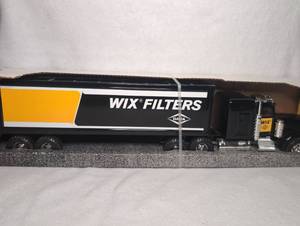 lot 1201 image: ERTL Peterbilt WIX Filters Semi Truck with Trailer