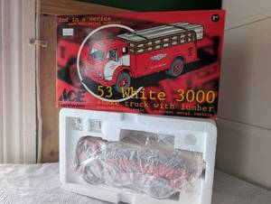 lot 1608 image: ACE Hardware 1953 White 3000 Stake Truck with Lumber Load 134 Scale Die-Cast Model