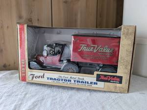 lot 1802 image: 1916 Ford Tractor Trailer True Value Hardware Die-Cast Metal Bank