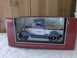 lot 1808 image: 1928 Chevrolet National AB True Value Die Cast Metal Collector Bank