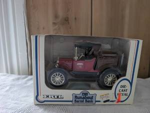lot 1810 image: ERTL 1918 Runabout Die-Cast Metal Coin Bank with Wood Detail
