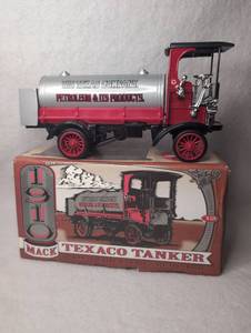 lot 1817 image: 1910 Mack Texaco Tanker Truck Die Cast Coin Bank