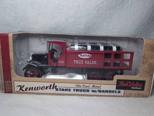 lot 1818 image: 1925 Kenworth Stake Truck with Barrels Die-Cast Model True Value Hardware