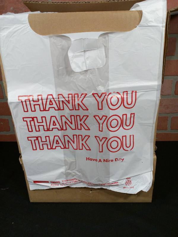 lot 55 image: Thank You T-Shirt Bags