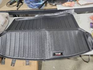 lot 5835 image: black Yonugli cargo liner for a vehicle trunk.