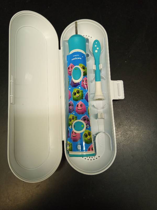 lot 2049 image: Philips Sonicare Kids Electric Toothbrush with Travel Case and Charger - Retail $25