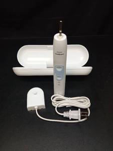 lot 1130 image: Philips Sonicare Electric Toothbrush with Travel Case - Retail $49