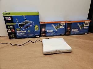 lot 6 image: Linksys Networking Bundle - Wireless Access Point and Gigabit Network Adapters