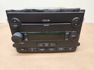 lot 9 image: Ford Factory Car Radio CD MP3 Player with AM FM
